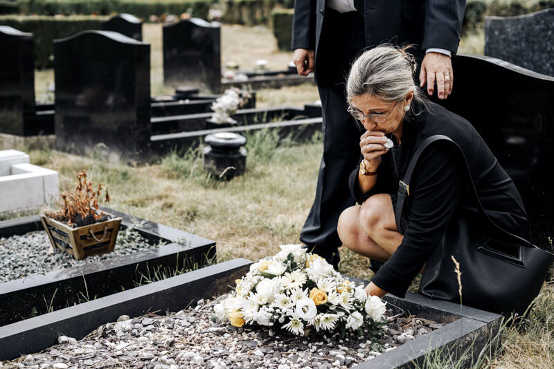 Woman at Graveside